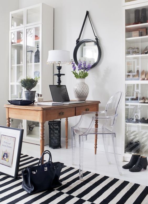 a lucite chair can easily fit almost any space, from a home office to a dining room