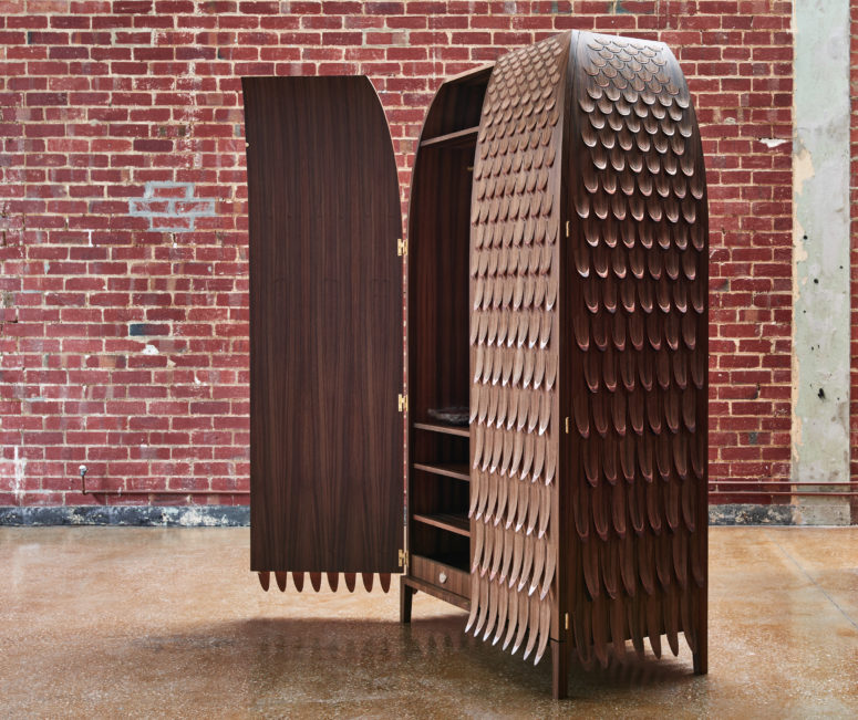 Monster wardrobe covered with veneer and copper in a scallopped pattern