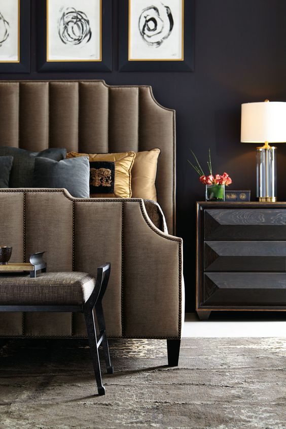 brown upholstered and nailed bed for an elegant space