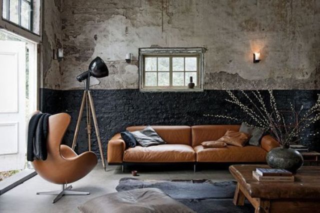 rock a cool leather sofa and matching chairs to make your living space refined