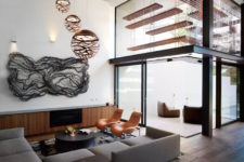 06 I love the open spaces inside, with elegant copper details and sculptural elements
