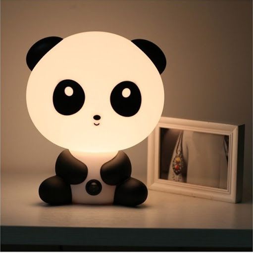 A panda table lamp   press its belly button and this charming lamp will lighten up the room with a soft glow