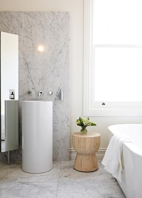 A round free standing sink easily makes any bathrooom fresher and more modern