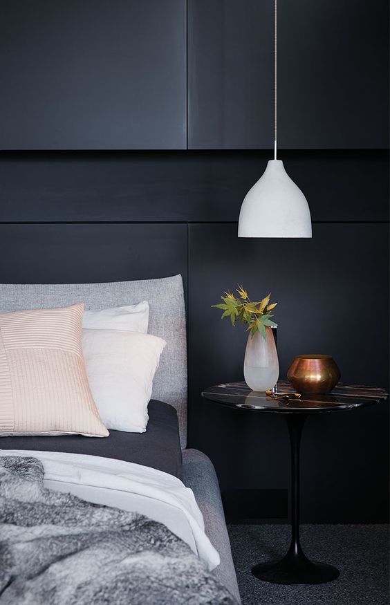 a white concrete pendant lamp is ideal for a modern or minimalist bedroom