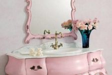 06 vintage pink bathroom vanity with a matching mirror