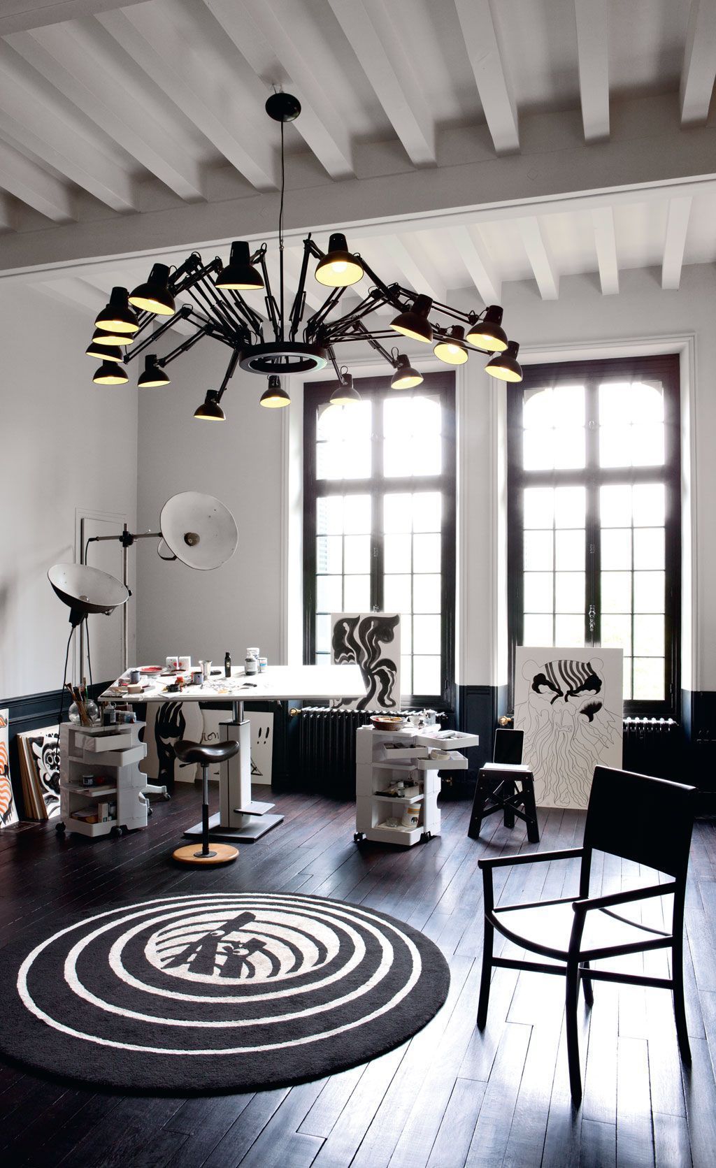 This is another studio space done in the same style, with the same lamps and similar decor