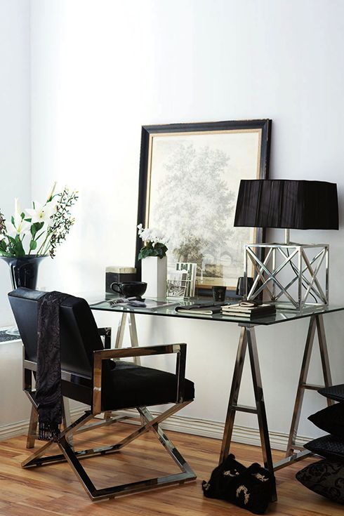 stylish metal leg and a glass top desk looks very masculine