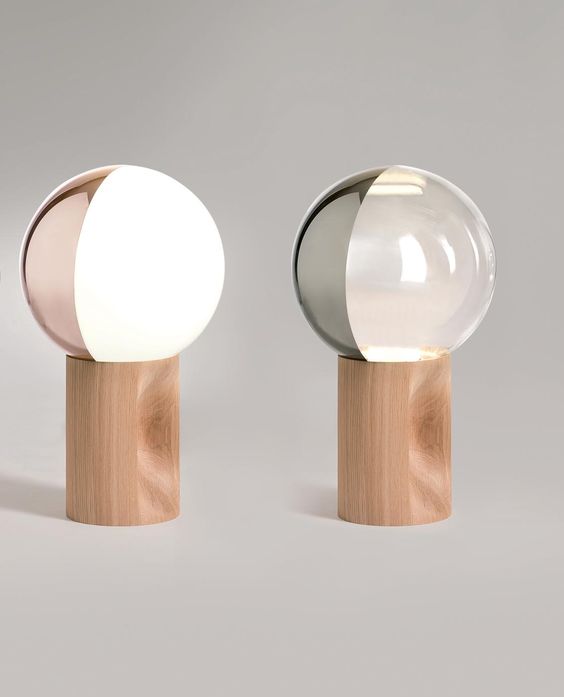 cute table lamps with a closed round color blocked shade and a wooden base
