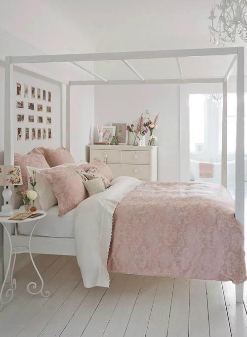 a white bed with holders for hanging curtains if needed looks lightweight