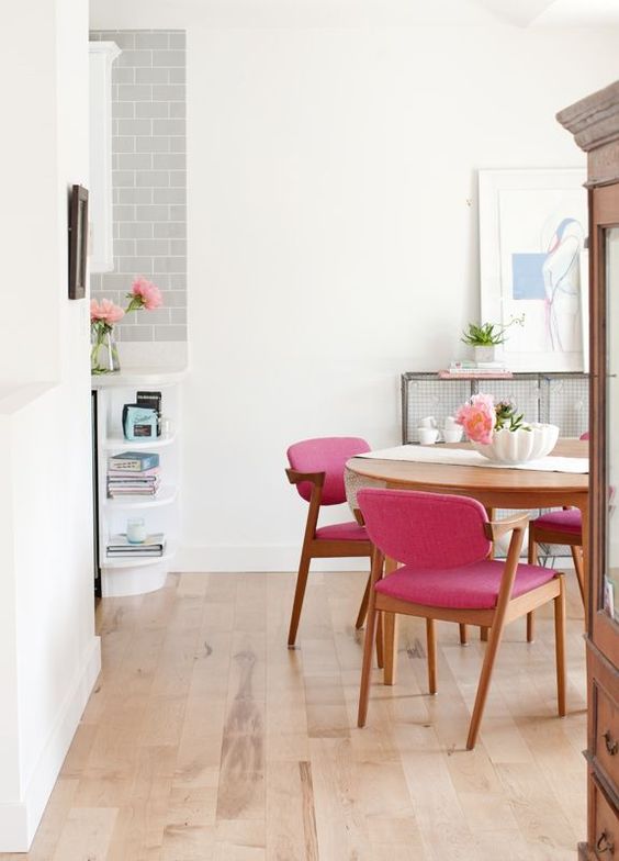 Mid century upholstered pink chairs are ideal for girlish spaces