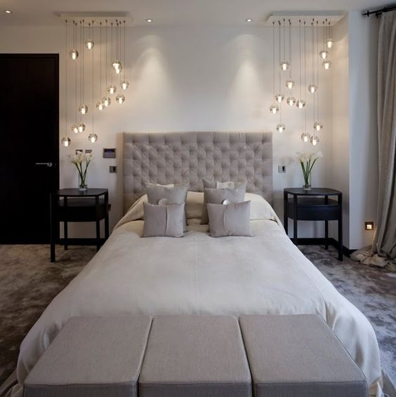 modern glass pendant lamp combos on each side of the bed bring a wow factor