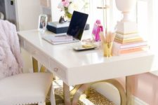 13 a white desk on gold sculptural legs for a glam feel