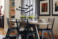 13 black chairs with thread backs look very modern and chic