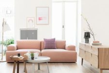 13 soft modern pink sofa with no legs bleds this Scandinavian room perfectly