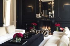 15 a black and white living room is given elegance and chic with a black chandelier and trasparent crystals
