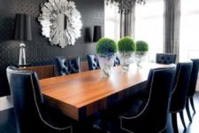 16 black leather tufted dining chairs with nailhead trim are the most eye-catching here