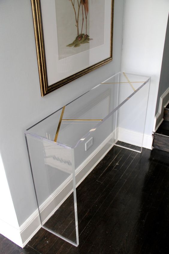 brass inlay lucite console will look very lightweight in an entryway