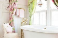 17 a girlish space with a white tub on gilded legs looks cute