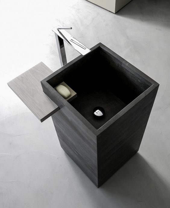 masculine sqaure dark sink with an integrated wooden shelf for soap