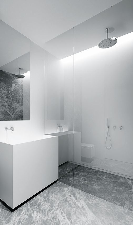 a minimalist square white sink for a minimal bathroom