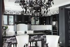 19 a modern black glam chandelier with black crystals is a fresh take on a traditional vintage one