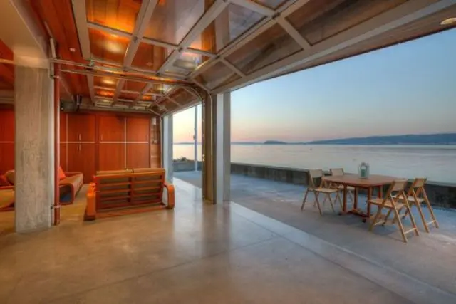 when you have such ocean views, you need to open the space to it with garage doors