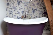 22 a small purple girlish tub on a polished metal stand