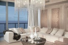 23 a modern living space with a corner sofa and long crystal chandliers with cascading crystals