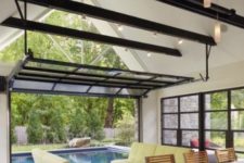 24 glass garage doors for opening out to the screen porch