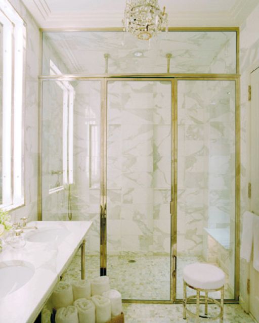 a timeless combo of white marble and gilded framing
