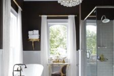 25 a vintage-inspired bathroom with a modern glass bubble chandelier that catches an eye