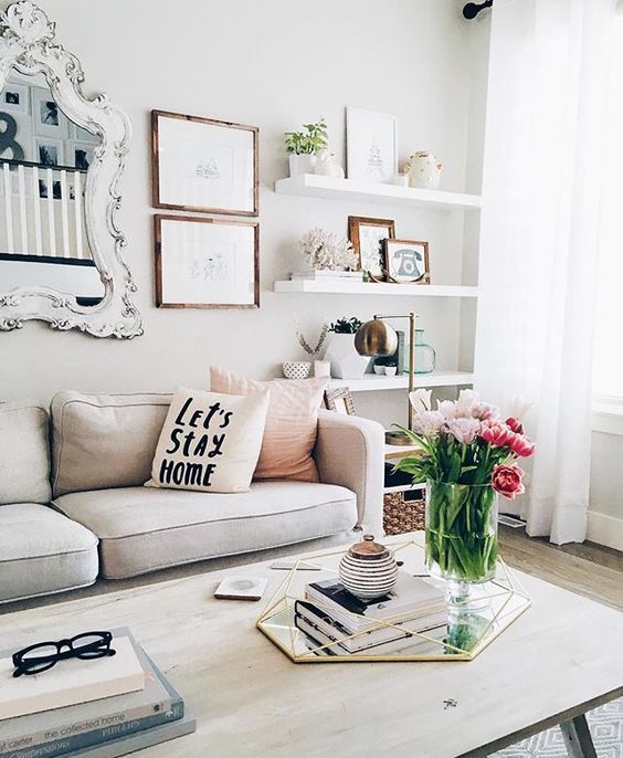 white floating shelves look awesome in this modern space
