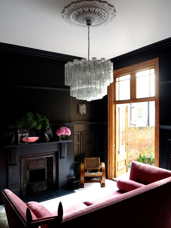 dark and feminine space with a refined statement crystal chandelier