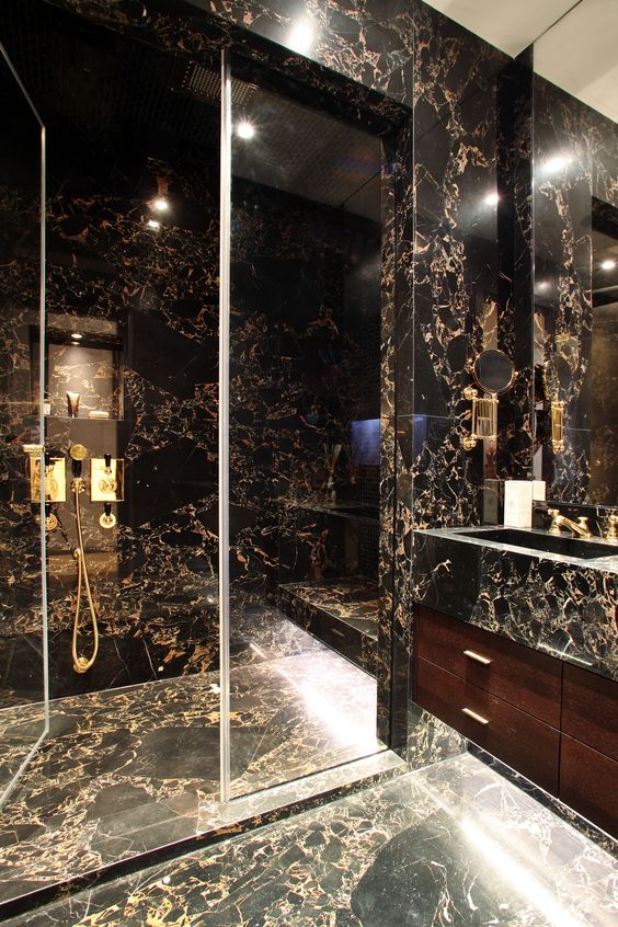 luxury black marble shower with gold details is just wow