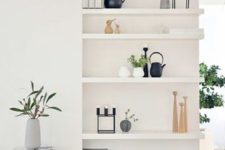 27 these white floating shelves look lightweight and perfectly fit a modern space