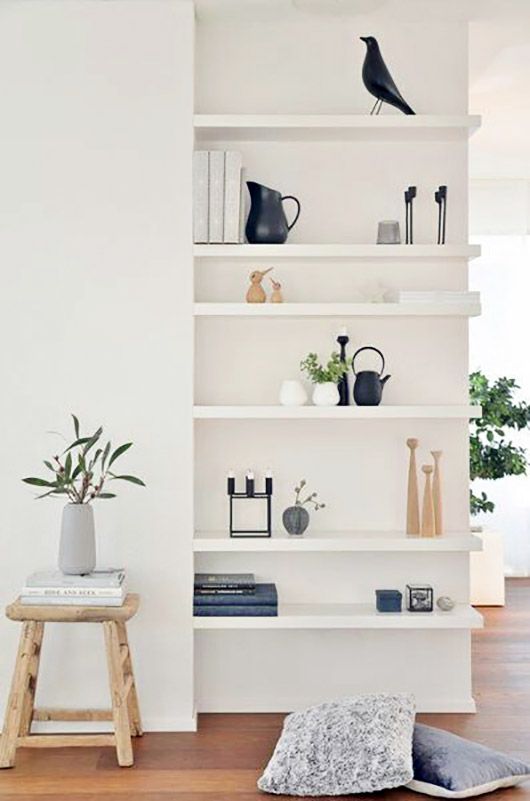 these white floating shelves look lightweight and perfectly fit a modern space