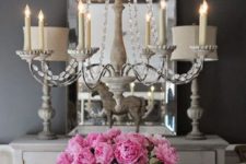 28 a refined vintage chandelier with crystals and faux candles