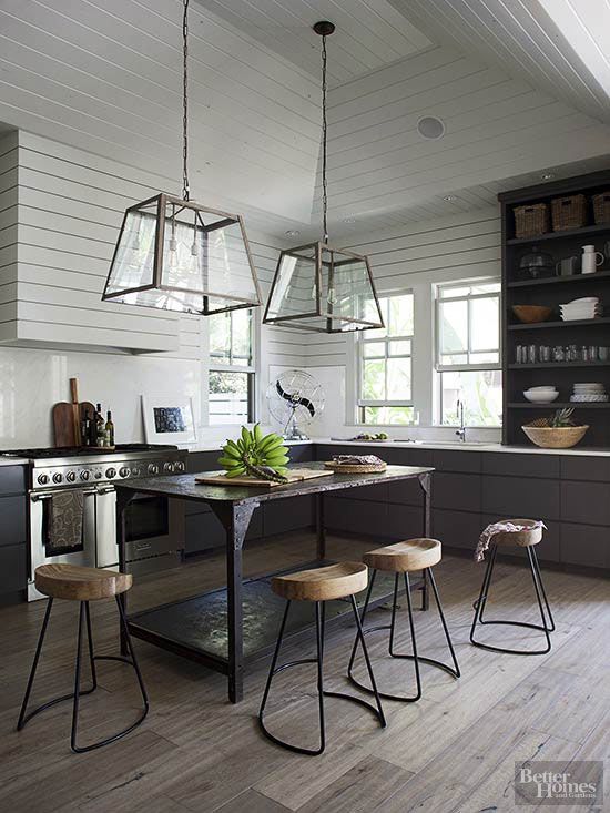 metal and glass pendant lamps over the kitchen island