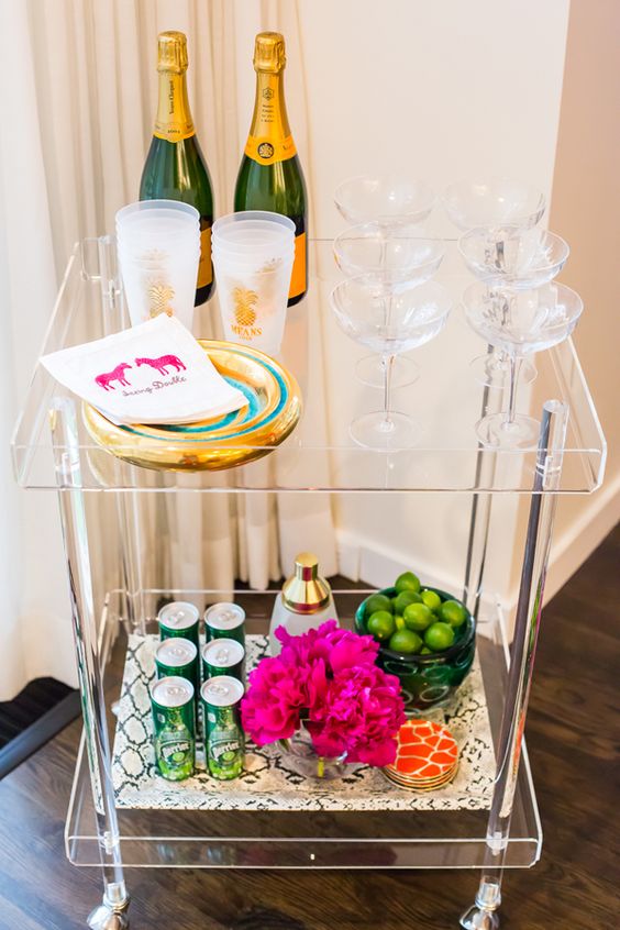 lucite rolling bar cart can easily fit any space