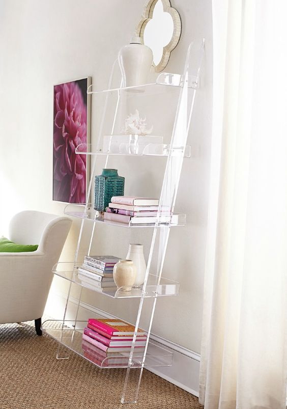 acrylic leaning bookshelf looks cool in this glam girlish space