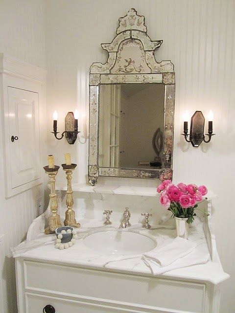 vintage mirror with a mirrored frame for a refined touch