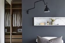 34 industrial black wall lamp doesn’t require any floor space or a bedside table