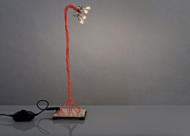 industrial table lamp with bold red cords and small bulbs