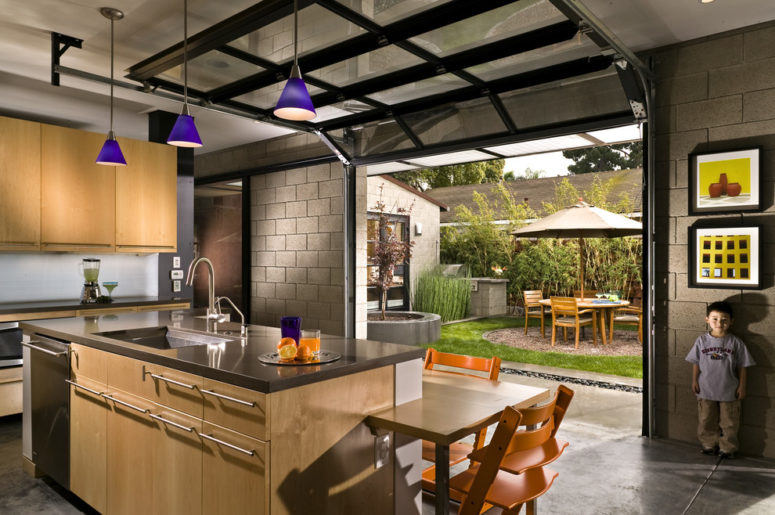 open your kitchen to the courtyard with a garage door to enjoy your meals outside