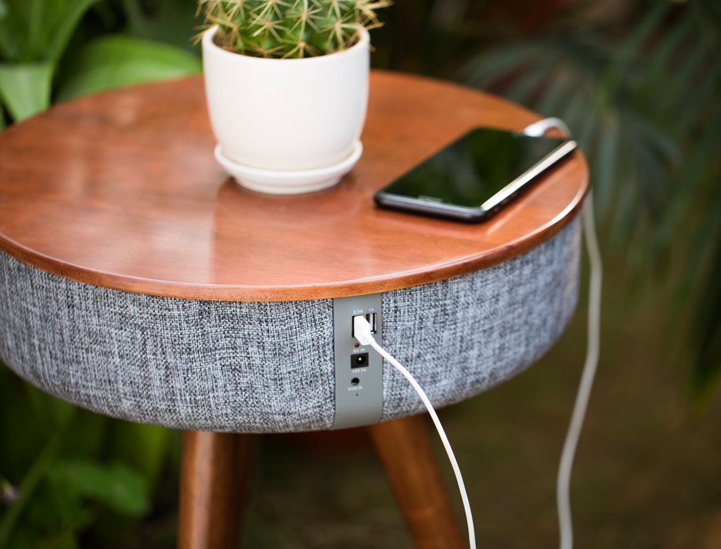 There are USB ports for your phones that allow charging