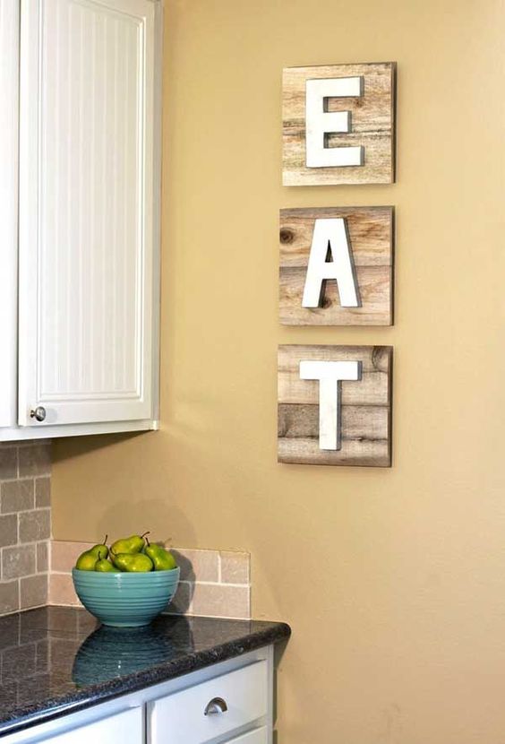 pallet boards with EAT letters is a popular idea for decorating kitchens