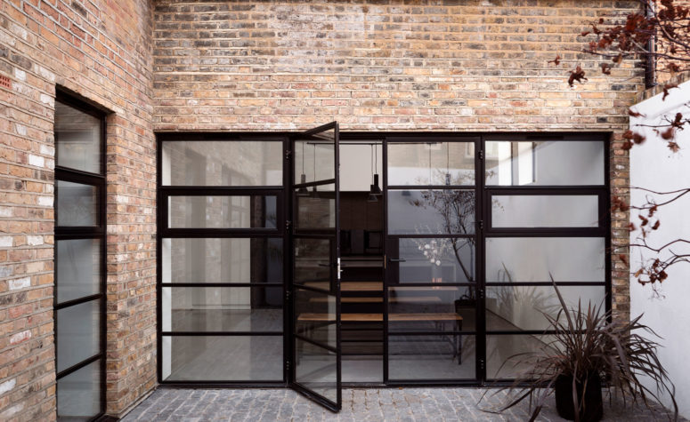 New gridded steel frame windows and an inner courtyard were added to the design, they bring much light in