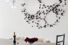 05 The dining area features a stunning butterfly installation on the wall