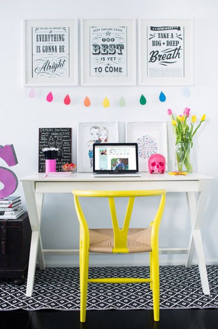 a bold banner and a neon yellow chair to give a fresh feel to the space