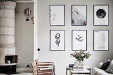 07 Brown leather chairs and black and white artworks add eye-catchiness to the space